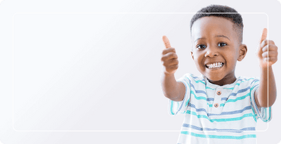 Child giving a thumbs-up gesture on a white background