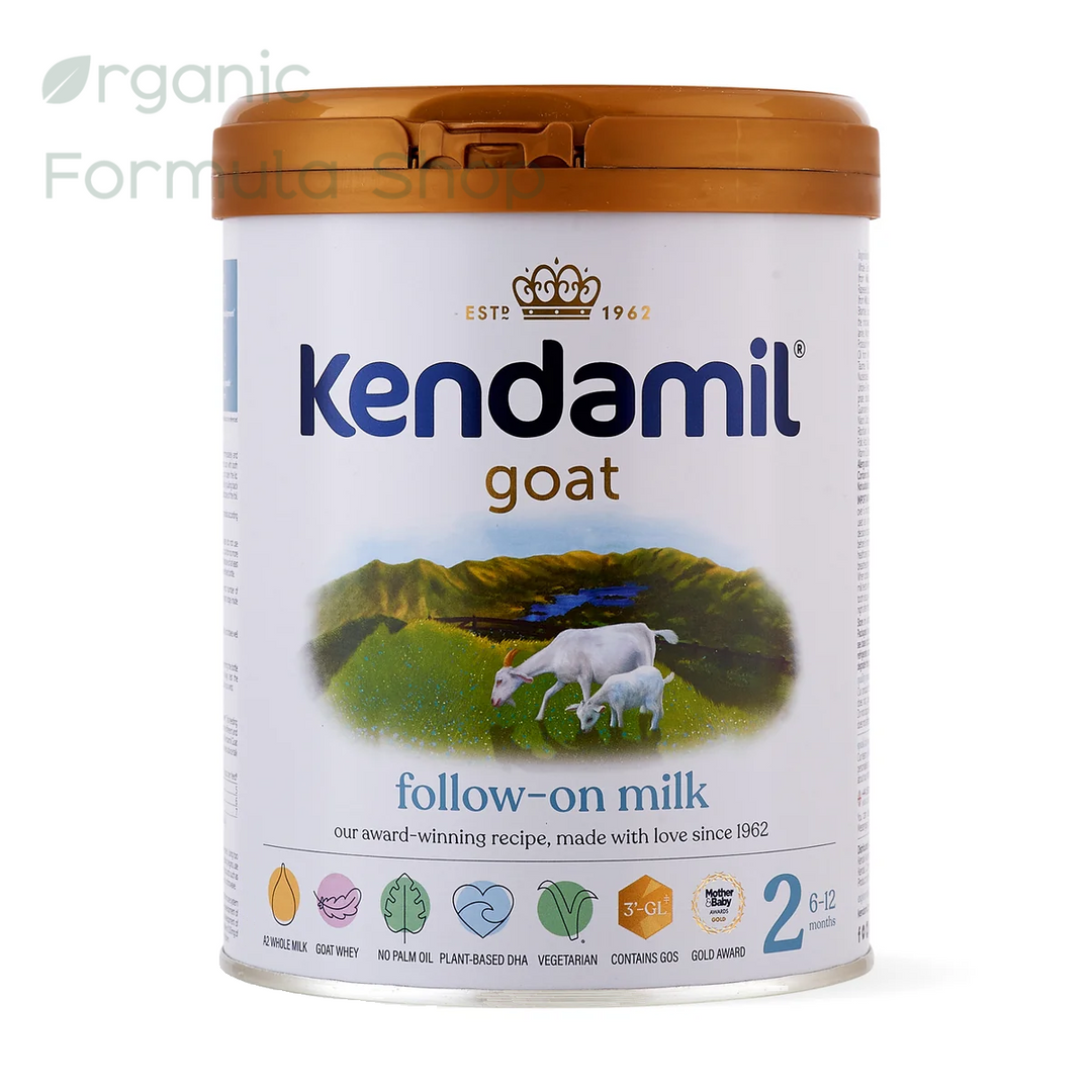A canister of Kendamil Goat Stage 2 follow-on milk powder, European palm-oil-free A2 goat milk follow-on formula in 800g tin, front of can, for babies 6 to 12 months. Kendamil goat  featuring a white label with a brown lid, set against a plain white background with a faint watermark.