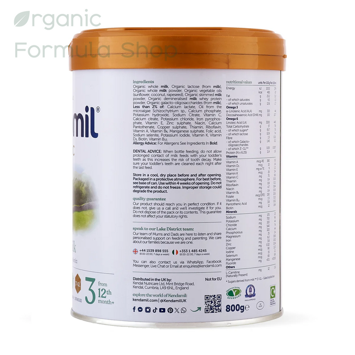 A canister of Kendamil UK Organic Cow Stage 3 European organic palm-oil-free toddler formula in 800g tin, front of can, for toddlers 12 months and older. Featuring a white label with a green landscape illustration and an orange lid, set against a plain white background. showing ingredients and contact information.